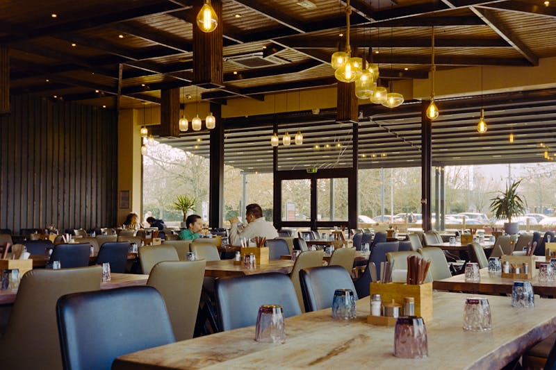 Wing Snob restaurant interior — warm and welcoming dining space